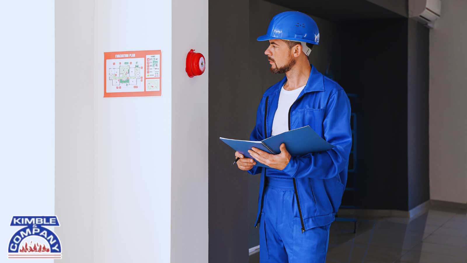 Proactive fire inspections by a technician reviewing an evacuation plan