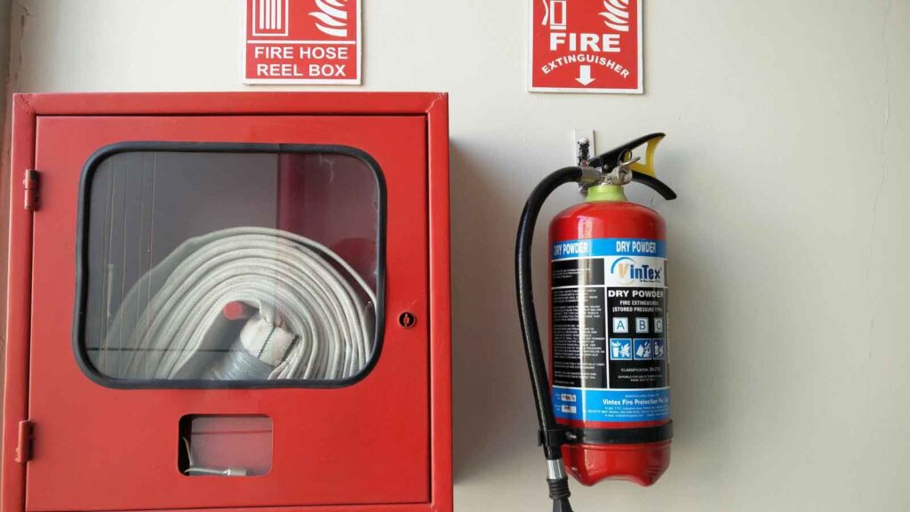 Wall-mounted fire extinguisher and hose reel box