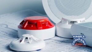 Fire alarm and smoke detector devices on blueprints.